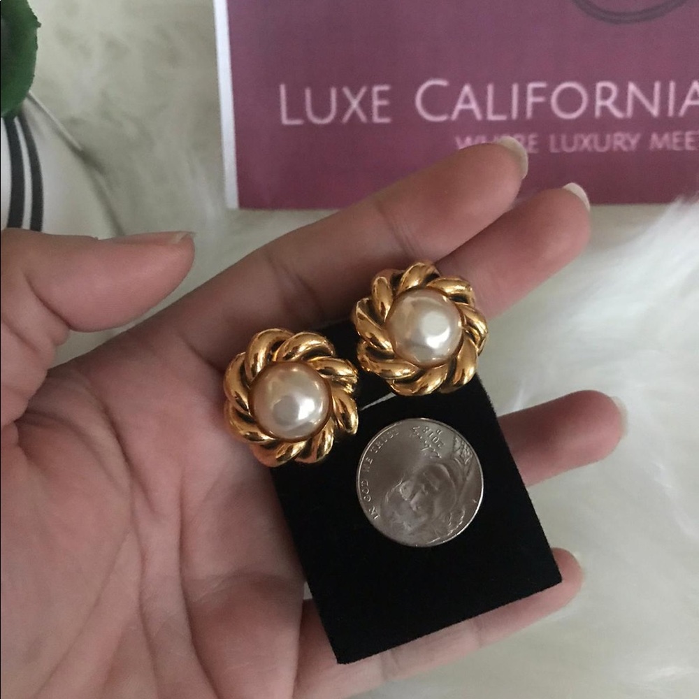 Authentic 100% Chanel Pearl Earrings .